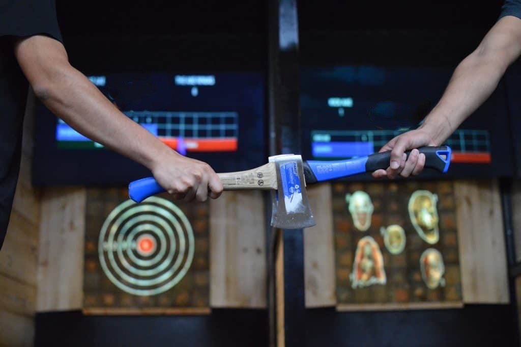 axe throwing with bar and projected targets near austin, texas